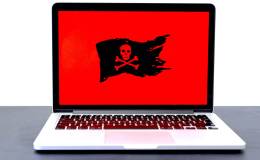 laptop with a pirate flag