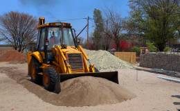 man operating a bulldozer on site