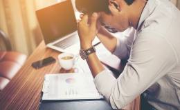 man stressed from work